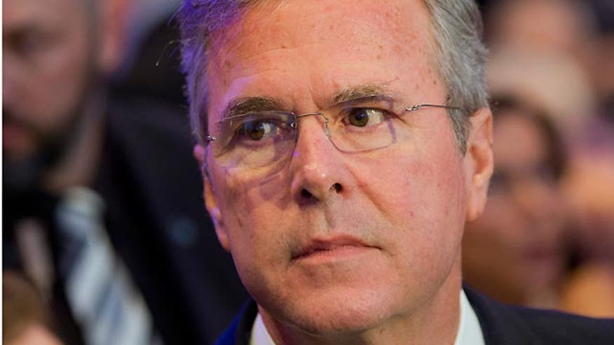 Former Florida governor slams Obama, Clinton in Germany