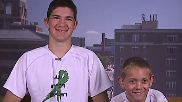 Teen carries brother 57 miles for cerebral palsy awareness