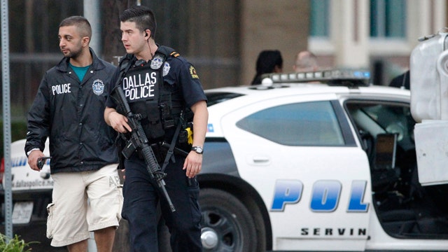 Gunmen open fire on Dallas police headquarters
