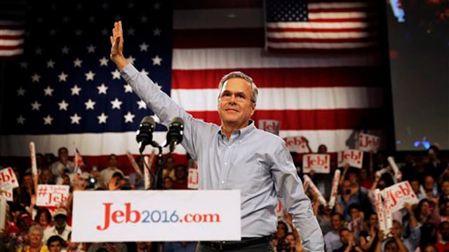 Bush standing on his record, not running from his name