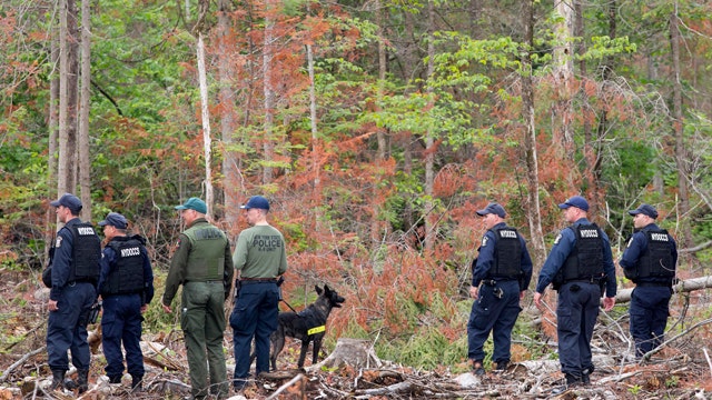 Manhunt for two escaped murderers expands
