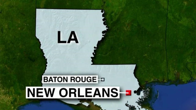 New Orleans police officer killed during suspect transport