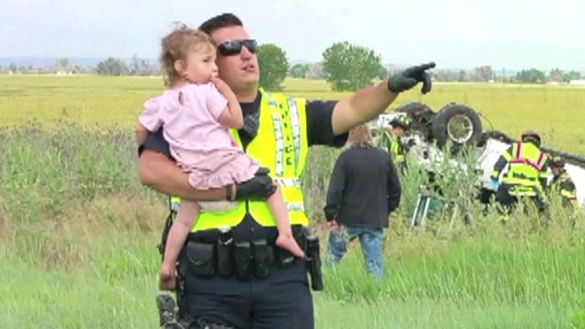 Police officer calms fears of frightened little girl