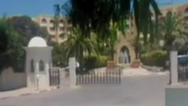 At least 27 dead after gunmen opened fire on Tunisian beach