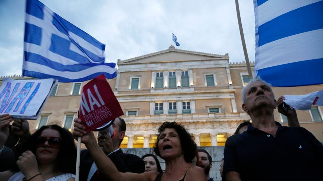 Greece defaults $1.8 billion IMF loan