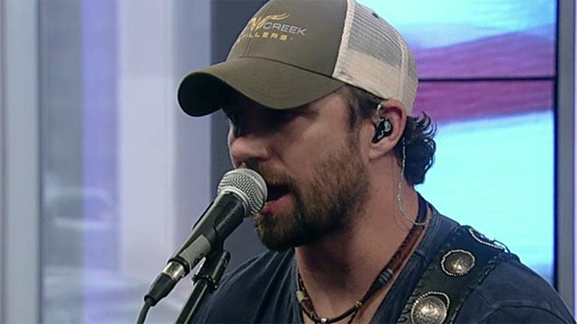 Country singer Pete Scobell pays tribute to those who serve