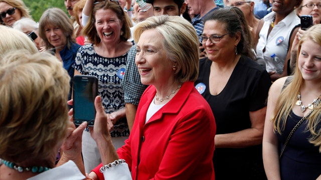 Clinton campaign vows to ease media access
