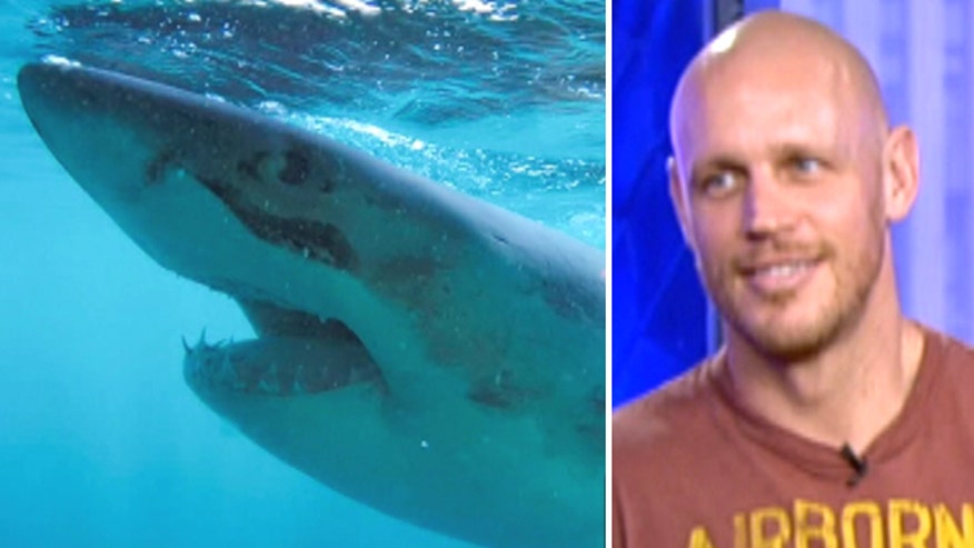 Navy diver who lost two limbs in shark attack goes on quest for 'Joan