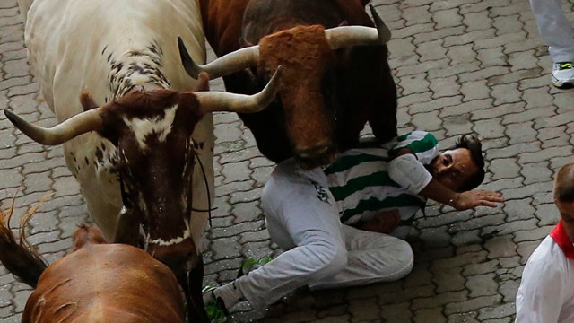 Bulls show no mercy on runners in day one of annual festival