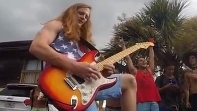 Guitarist arrested playing National Anthem on Fourth of July