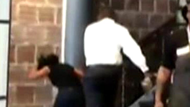 Male manager caught on tape hitting female employee