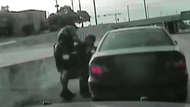 Hero cop's Heimlich maneuver saves choking driver on highway