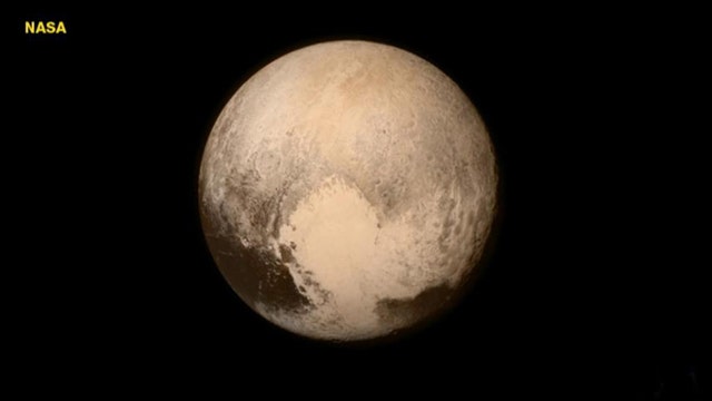 NASA celebrates mankind's first up-close look at Pluto
