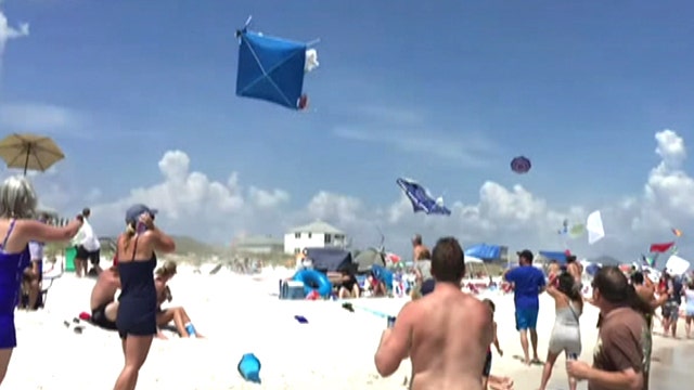 Blue Angels buzz beach: Jets send umbrellas, tents flying