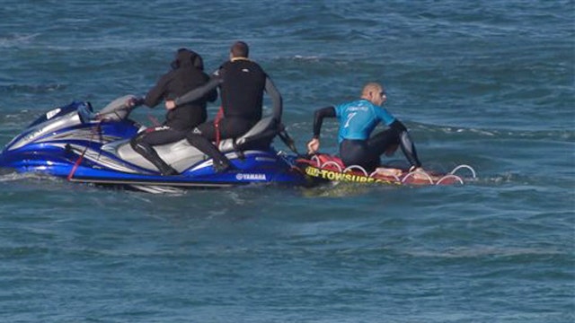 Surfer's fight for survival against shark caught on video