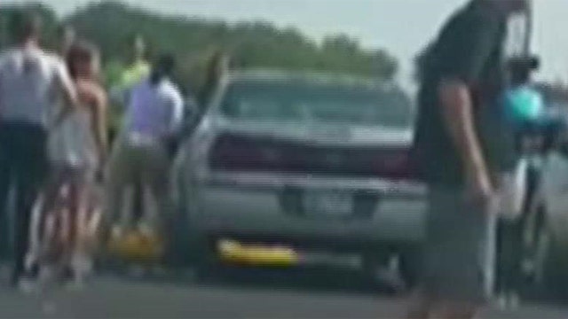 Woman uses trailer hitch to save toddler trapped in hot car