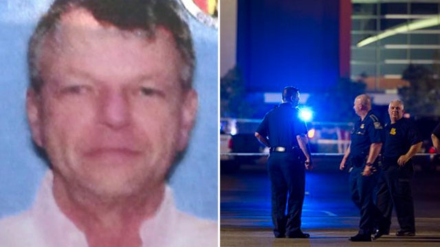 Theater shooter identified as 59-year-old John Russel Houser