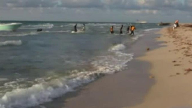Video allegedly shows illegal immigrants storming shore