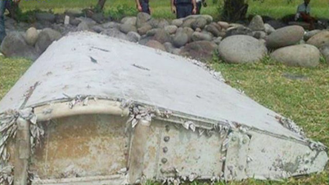 Debris examined for link to missing Malaysia Airlines plane