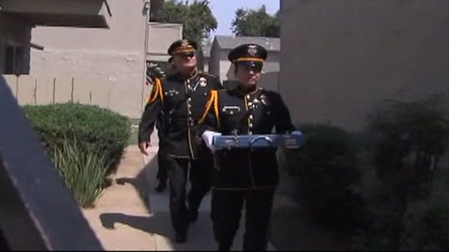 Honor guard return wedding album to former Army interpreter