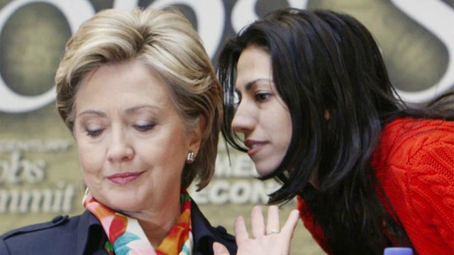 Was Clinton's top aide improperly paid at State Department?
