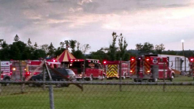 Report: Tent collapse kills 2, leaves 15 injured