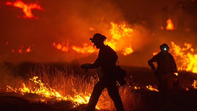 Over 13,000 people urged or forced to flee Calif. wildfire