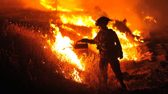 Firefighters battling more than 20 wildfires in Calif.