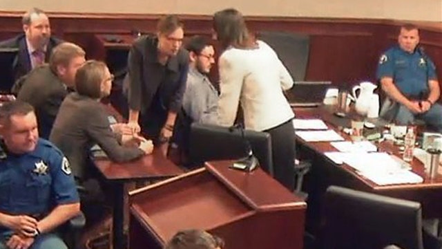 Holmes jury deliberates after victims' families testify