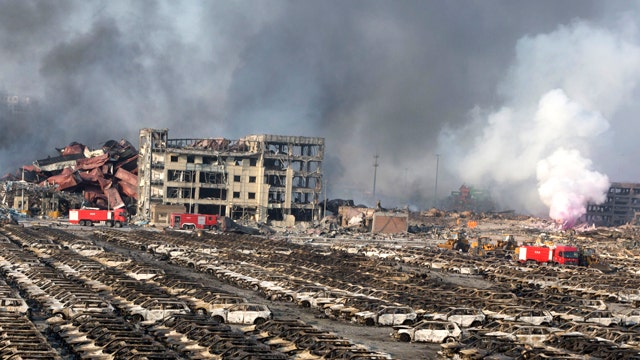 Deadly warehouse explosions kill dozens in China