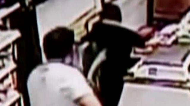 Clerk with massive sword fights off machete-wielding robbers