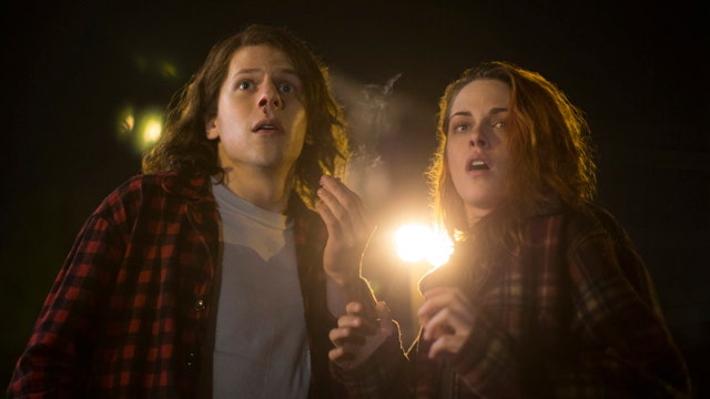 Jesse Eisenberg and Kristen Stewart run for their lives