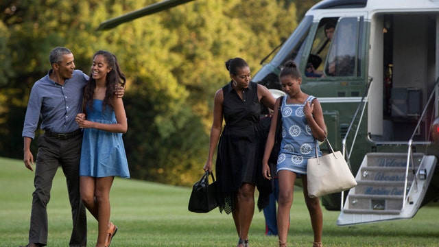 President Obama returns from vacation to packed agenda