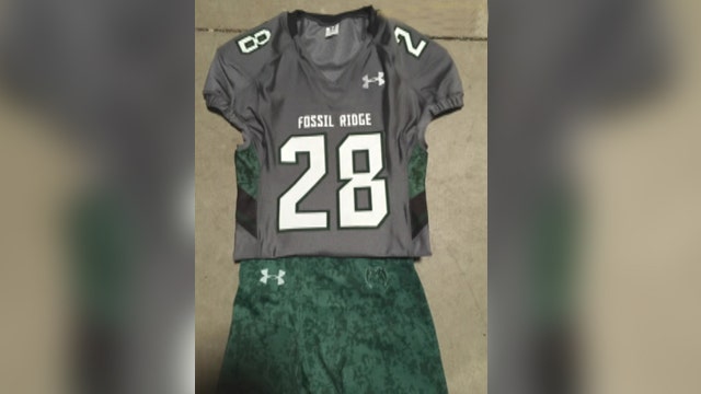 School district, football team at odds over military tribute