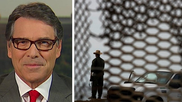 Perry says securing the border with a wall is 'not reality'