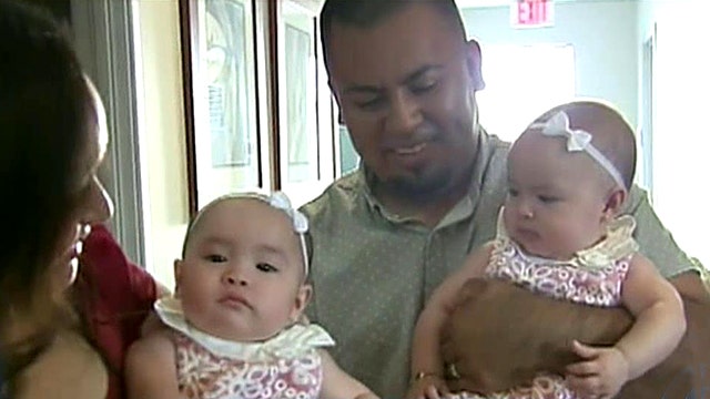 Magical moment deaf twin babies hear for first time