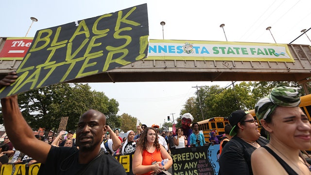 Black Lives Matter protesters taunt cops