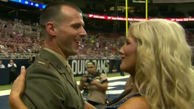 Rams cheerleader surprised by Marine husband 