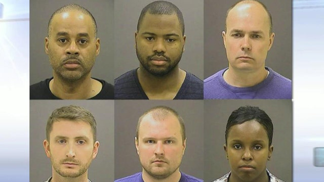 Judge rejects Baltimore cops' request to move trial