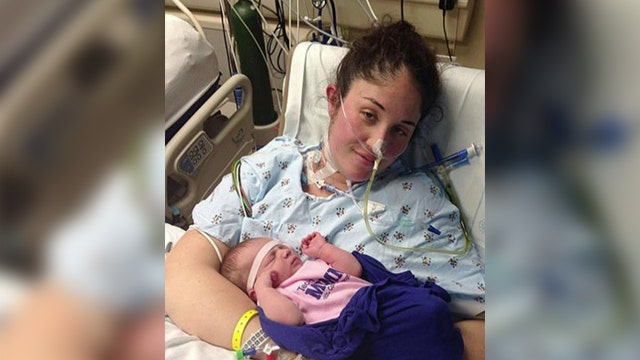 Mother awakens from coma after hearing newborn baby's cries