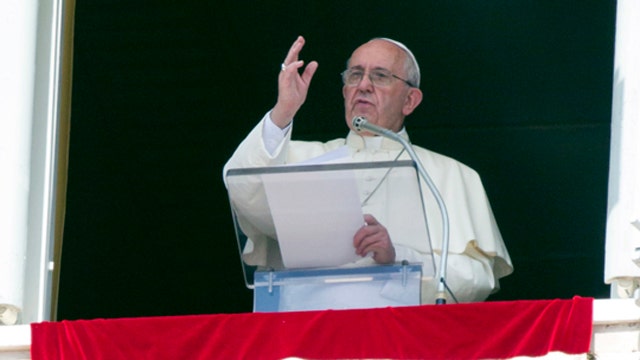 Pope blames refugee crisis on 'God of money'