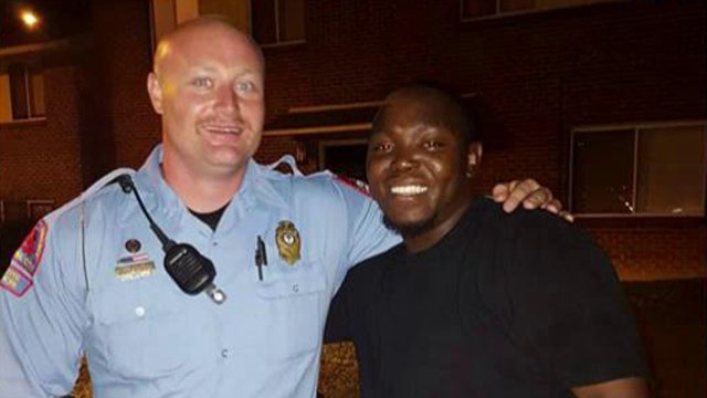 Police officer embraces former offender in viral picture