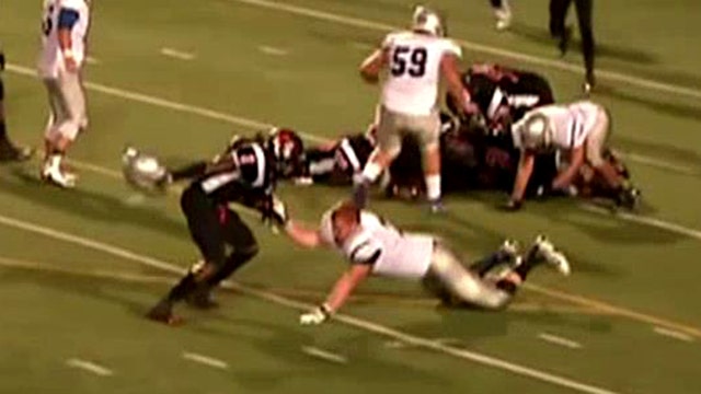Offensive foul: Player hits opponent in head with helmet
