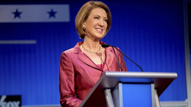 Fiorina's record questioned after strong debate performance