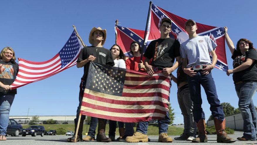 Group of teens from Christiansburg High School in Virginia proudly display fag after being told to leave school grounds when they refused to remove clothing