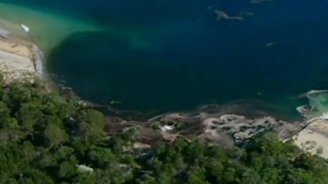 Massive sinkhole opens on Australian beach