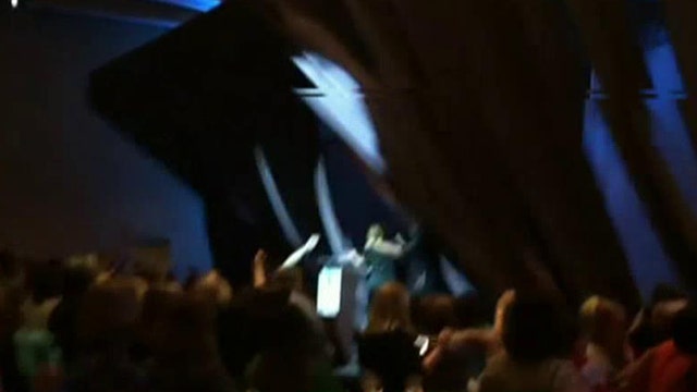 Stage partially collapses around Fiorina during Texas event