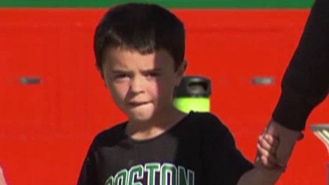 7-year-old boy finds $8,000, gives it back