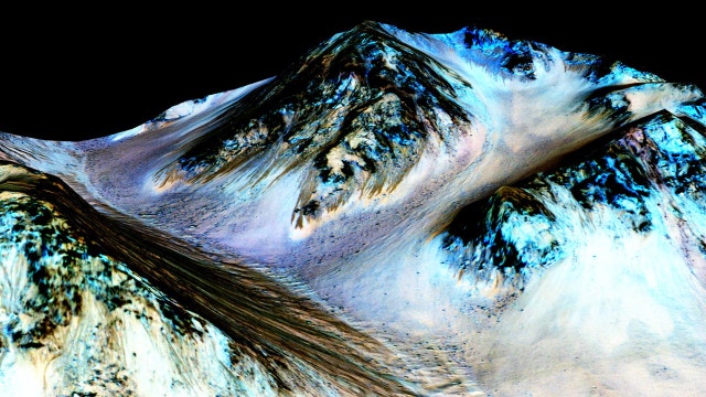 NASA confirms evidence that liquid water flows on Mars