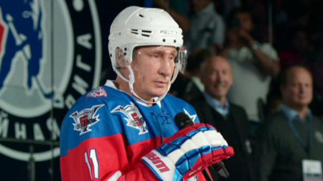 Putin celebrates birthday with hockey accolades